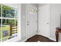 Bright foyer with a decorative front door and a view to the outside at 1650 Randee Nw St, Atlanta, GA 30318