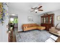 Comfortable living room with leather sectional, accent chair, and decorative rug at 1650 Randee Nw St, Atlanta, GA 30318