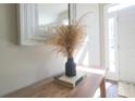 Close up view of foyer table and decor at 175 Diamond Ridge Ave, Canton, GA 30114