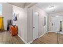 Inviting entryway with wood-look floors, neutral walls, and stylish decor at 4657 Tartan Ct, Union City, GA 30291