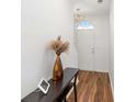 Bright foyer with hardwood floors and stylish console table at 1688 Jackson Sq, Atlanta, GA 30318