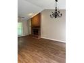 Inviting living room with vaulted ceilings and a brick fireplace at 861 Creek Nw Trl, Kennesaw, GA 30144