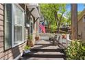 Inviting front porch provides a relaxing outdoor space with wood flooring at 957 Piedmont Ne Ave # A, Atlanta, GA 30309