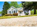 Eye-level image highlighting the home’s entrance and front yard, complete with lush greenery at 4066 Harvest Ridge Dr, Douglasville, GA 30135