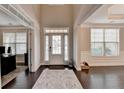Bright foyer with hardwood floors and lots of natural light at 5525 Nesmith Ct, Cumming, GA 30040