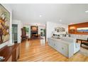 Open-concept living room features hardwood floors, stylish decor, and a dining area at 2324 Bry Mar Ne Dr, Atlanta, GA 30345