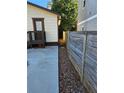 A narrow pathway alongside the home, bordered by a wooden fence at 3268 Mae Ave, Brookhaven, GA 30319