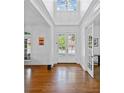 Bright foyer with hardwood floors, soaring ceilings, and beautiful natural light at 1045 Westcroft Ln, Roswell, GA 30075