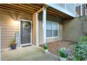 Condo doorway with welcome sign and a wreath hanging on the front door at 2120 River Heights Se Walk, Marietta, GA 30067