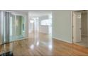 Spacious living area with hardwood floors offers seamless transition to kitchen and outdoor balcony at 2120 River Heights Se Walk, Marietta, GA 30067