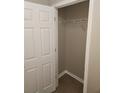 Small closet with a wire shelf and neutral walls, perfect for additional storage at 3336 Waldrop Trl, Decatur, GA 30034