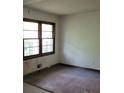 Image of a Bedroom with hardwood floors and natural light from a window at 1888 Delphine Dr, Decatur, GA 30032
