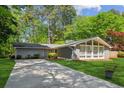 Lovely single story home with well-kept lawn and long driveway at , Stone Mountain, GA 30088
