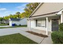 Inviting single-story home showcasing a tidy front yard and covered entrance at 191 Misty Ridge Trl, Stockbridge, GA 30281