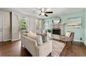 Comfortable living room with fireplace, stylish furniture, and ample natural light at 385 Russell Ridge Dr, Lawrenceville, GA 30043