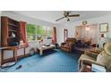 Bright living room with large window and neutral colored walls at 5335 Old Floyd Sw Rd, Mableton, GA 30126