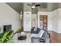 Relaxing living room area featuring stylish seating, wood floors, and a bright atmosphere at 620 Glen Iris Ne Dr # 410, Atlanta, GA 30308