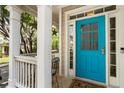 Close-up of a bright blue front door with white trim and sidelights at 2238 Parkview Nw Ct, Atlanta, GA 30318