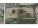 Aerial view of the property and surrounding land, highlighting the property lines at 1277 Bethany Rd, Covington, GA 30016