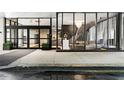 Modern building entrance featuring glass doors, contemporary decor, and stylish lobby interior at 145 15Th Ne St # 435, Atlanta, GA 30309