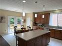 Eat-in kitchen with stainless appliances, ample counter space and a sliding door to the deck. Ideal for entertaining at 985 Forest Knoll Court, Lithia Springs, GA 30122