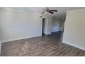 Inviting living room with hardwood floors, fresh paint, and bright natural light at 2825 Northeast Expy # F 03, Atlanta, GA 30345