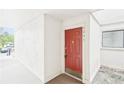 Unit 2201 featuring a red front door with gold hardware and address numbers at 2201 Huntingdon Chase St, Atlanta, GA 30350
