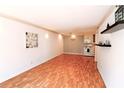 Bright living room with hardwood floors, neutral paint, and modern decor at 1181 Church St # D, Decatur, GA 30030
