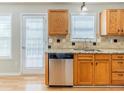 Kitchen with granite countertops, stainless steel appliances and lots of natural light at 4357 James Wade Dr, Snellville, GA 30039