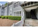 Building exterior showcases a stairway and well-maintained landscaping at 211 Summit North Drive Ne, Atlanta, GA 30324