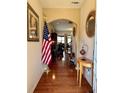 Elegant entryway with hardwood floors and classic decor at 3315 Sardis Bend Dr, Buford, GA 30519