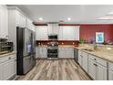 Modern kitchen features stainless steel appliances, granite countertops and plenty of cabinet space at 625 Aunt Lucy Sw Ln # 61, Smyrna, GA 30082