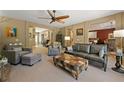 Inviting living room with neutral walls, plush seating, and a colorful accent ottoman at 625 Aunt Lucy Sw Ln # 61, Smyrna, GA 30082