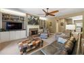 Comfortable living room with built-in shelving, a brick fireplace and cozy seating at 625 Aunt Lucy Sw Ln # 61, Smyrna, GA 30082