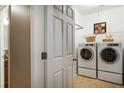 Spacious laundry room area with included washer and dryer, and plenty of space at 6865 Fletcher Dr, Winston, GA 30187
