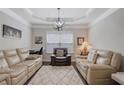 Cozy living room featuring recessed lighting, decorative ceiling, and neutral color palette at 486 Crestmont Ln, Canton, GA 30114