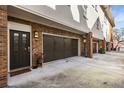 Attached two-car garage offers convenient parking with an adjacent door and well maintained exterior at 700 Piedmont Ne Ave # 4, Atlanta, GA 30308