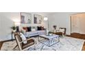 Well-lit living room with modern furniture, stylish decor, and ample space for entertaining at 1362 Briarcliff Ne Rd, Atlanta, GA 30306