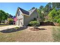 Lovely two-story home with a manicured lawn and an attached two-car garage at 192 Adelaide Xing, Acworth, GA 30101