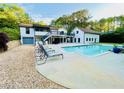 Backyard pool with lounge chairs and a view of the multi-level deck at 345 Etheridge Rd, Auburn, GA 30011