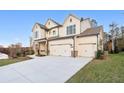 Beautiful home with a three car garage and a large concrete driveway at 2340 Ellis Mountain Dr, Marietta, GA 30064