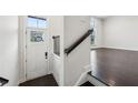 Bright entryway with hardwood floors and a view of the exterior at 687 Avondale Creek Dr, Decatur, GA 30032