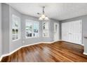 Bright dining room with wood floors, white trim, and plenty of natural light at 4413 Pinscher St, Union City, GA 30291
