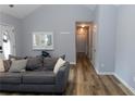 Inviting living room with wood floors and neutral walls at 1043 Foxhollow Trl, Canton, GA 30115