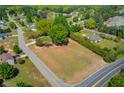 Expansive vacant lot in a residential area offering the perfect opportunity to build your dream home at 1312 Harbins Rd, Dacula, GA 30019