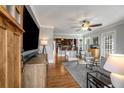 Cozy living room featuring hardwood floors and an open floor plan to the kitchen at 1763 Delaware Ne Ave, Atlanta, GA 30307