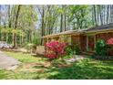 A close up of the front of the house with a view of the trees at 2680 Irene Dr, Marietta, GA 30066