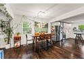 Eat-in kitchen with stainless steel appliances and stylish lighting at 3143 Church St, East Point, GA 30344