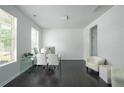Contemporary office space features ample natural light, hardwood floors, and modern furniture at 2649 Ogden Trl, Buford, GA 30519