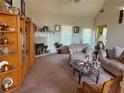 Cozy living room features a fireplace and neutral tones at 4206 Shoreside Cir, Snellville, GA 30039
